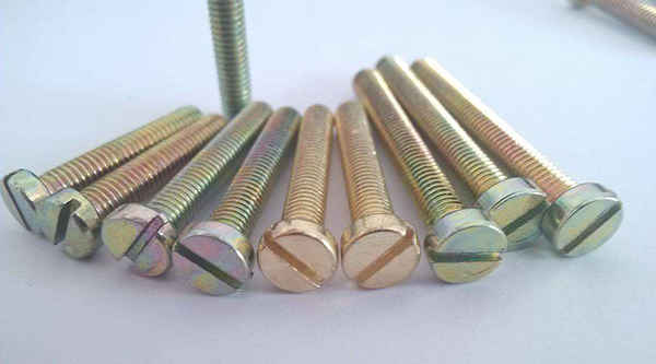 How are slotted screws produced? Explain the production process of slotted screws.