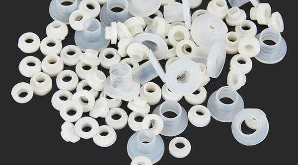 Production of t-shaped gaskets, transistor gaskets, nylon bushings, insulating particles, t-shaped gaskets